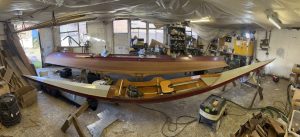 Phelps single scull and double skiff being restored